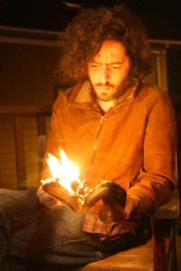 Daniel Bejar Destroyer reading a book on fire.