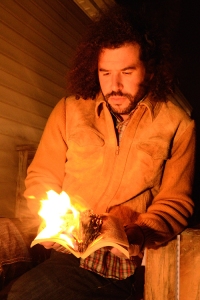 Daniel Bejar Destroyer reading a book on fire.